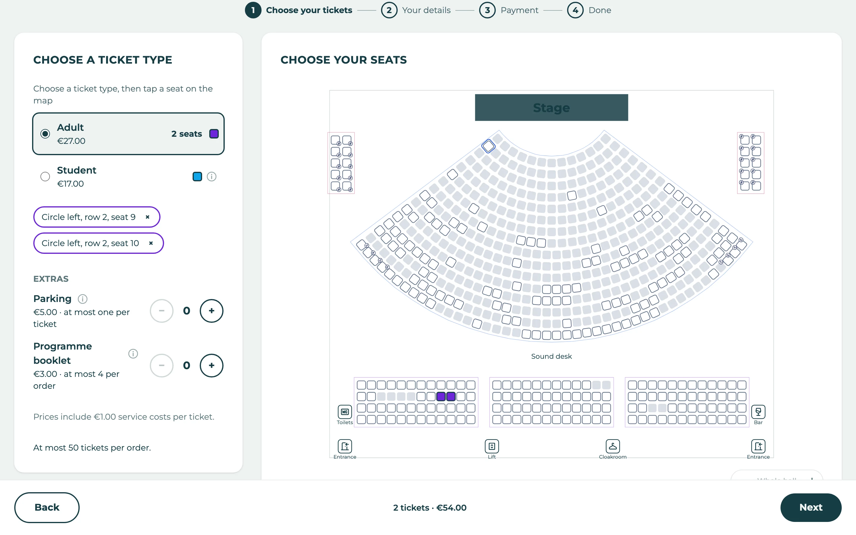 A buyer choosing their seats on the plan of the hall, with two seats chosen.